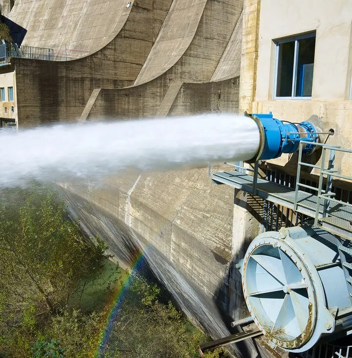 hydropower turbine pumping water from dam